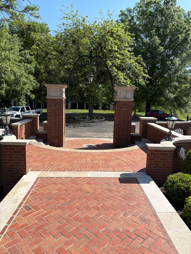 Paver and stone flatwork at estate entrance