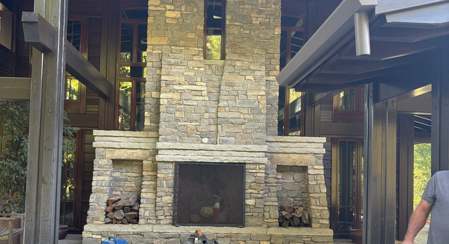 Custom outdoor fireplace and fire feature