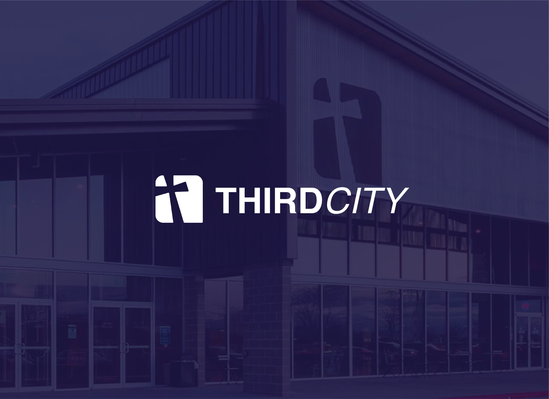 The logo for Third City Church features a cross icon set against a backdrop of a modern building exterior.