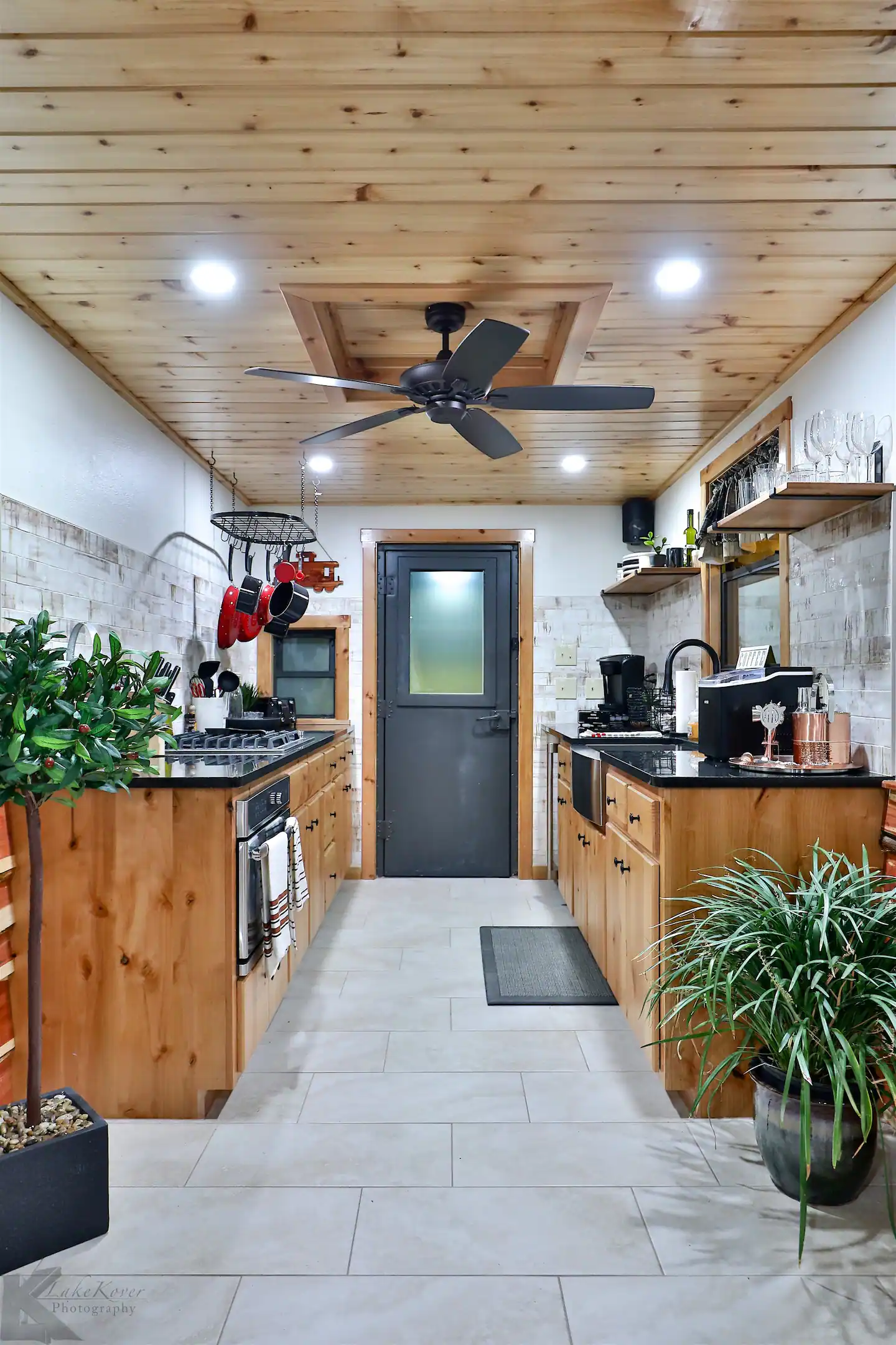 the kitchen at the caboose rental on flores ranch. Luxury airbnb listing in Baird TX.