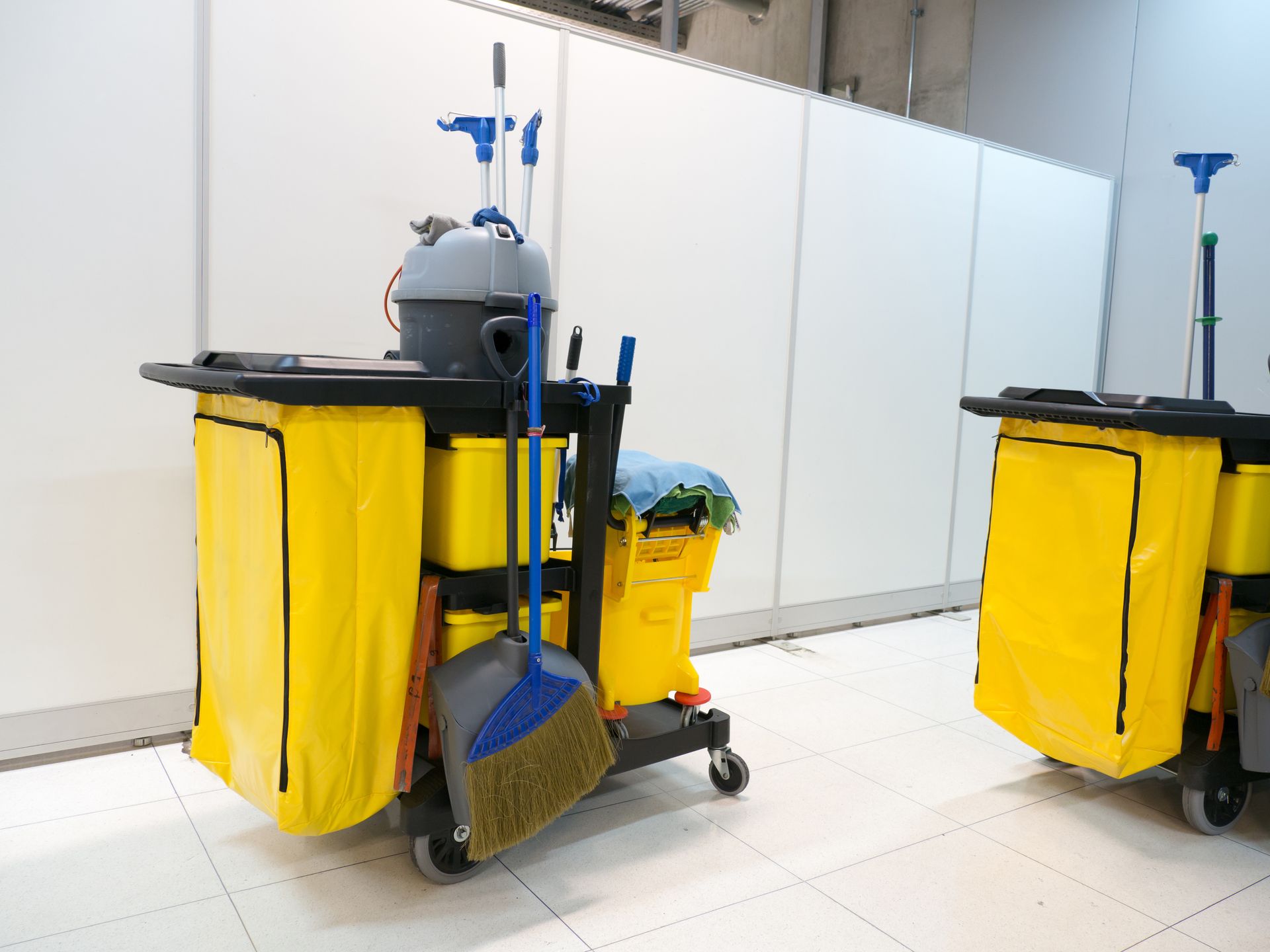 Commercial cleaning equipment and supplies in a professional workspace