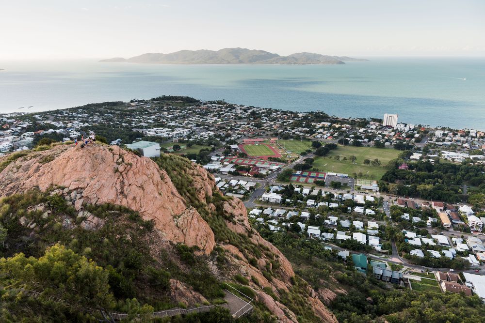 An Aerial View of a City With a Marina and Boats in the Water — Lynams Landscapes Pty Ltd in Castle Hill, QLD