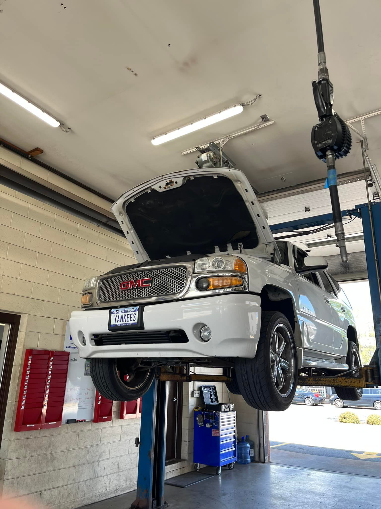 Car Undergoing Maintenance | Airbase Automotive Repair Inc