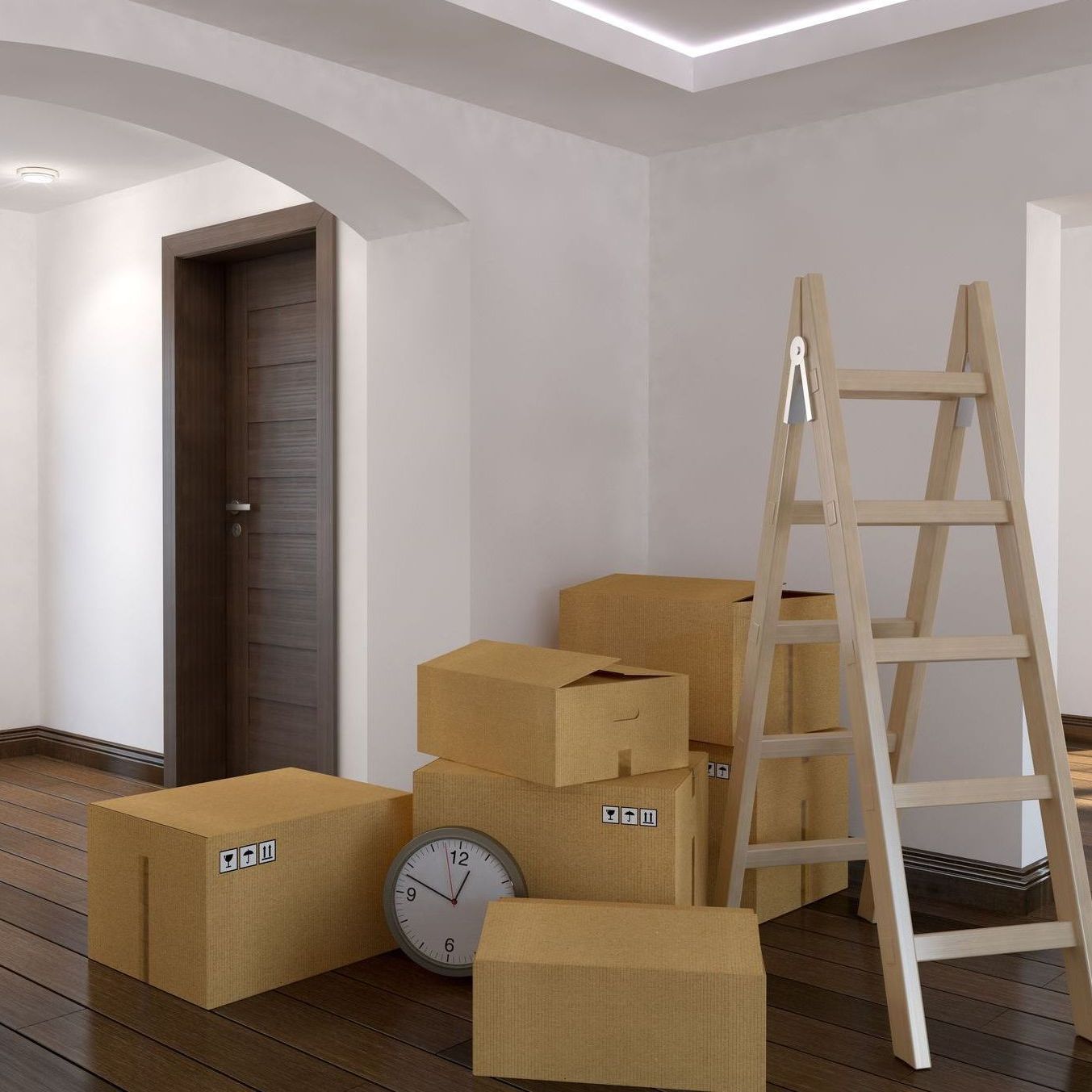 A room with boxes and a clock and a ladder