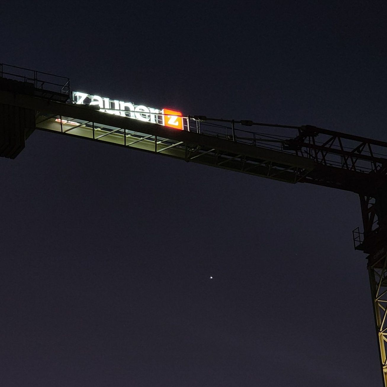 illuminated crane sign zauner
