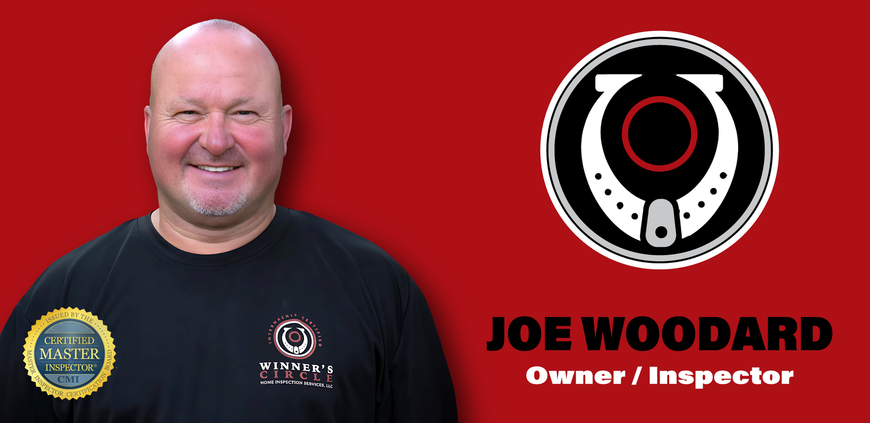A man is smiling in front of a logo for joe woodard