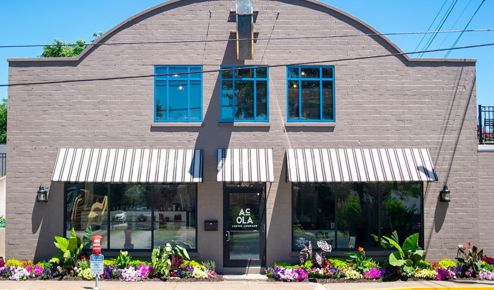 Outdoor patio with flowers at Acola Coffee Company Columbia MO