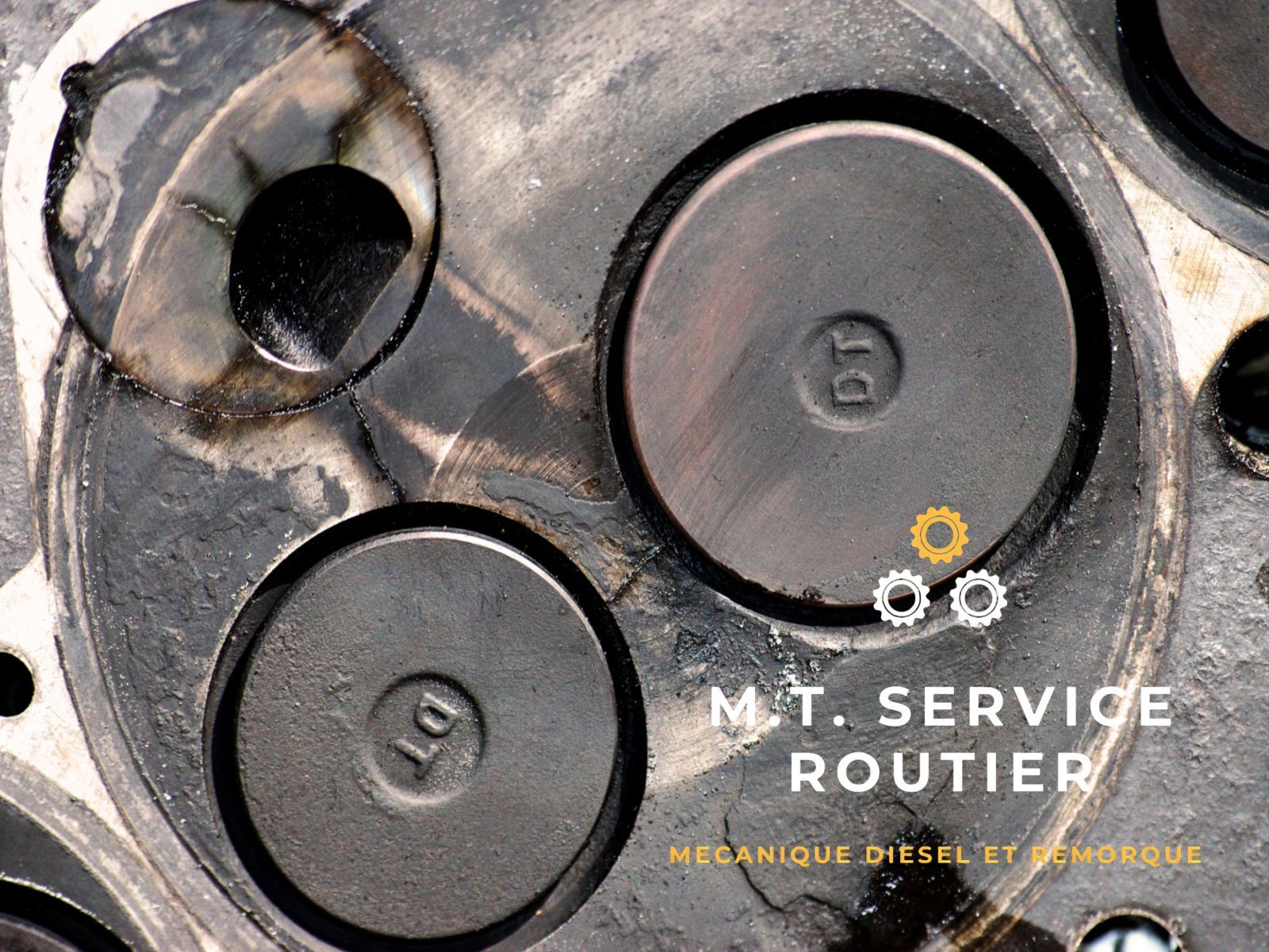 Un gros plan d'un objet métallique avec les mots mt service routier en bas