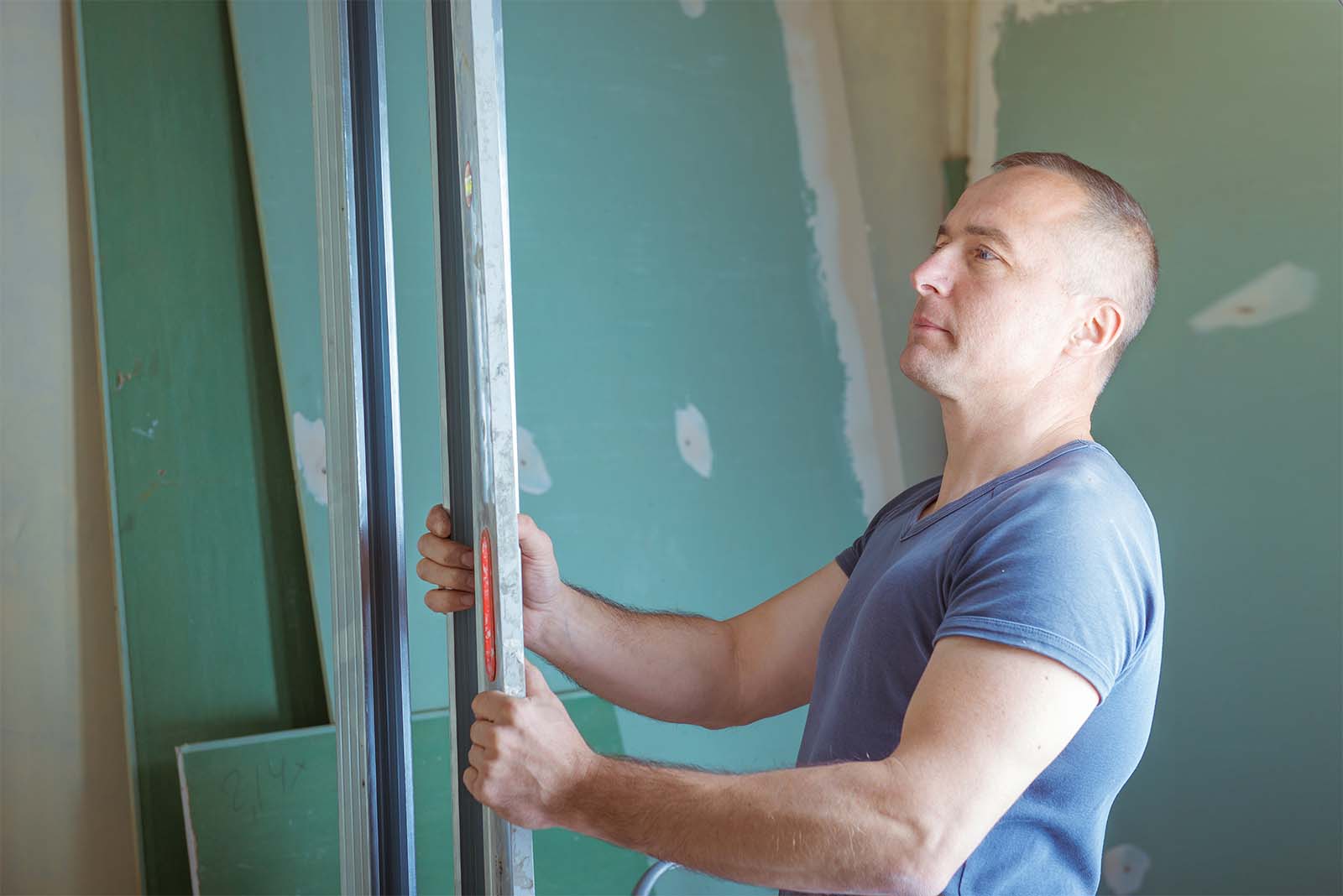 Qualified Cairns Plasterer Installing Internal Gyprock Lining To A Shed