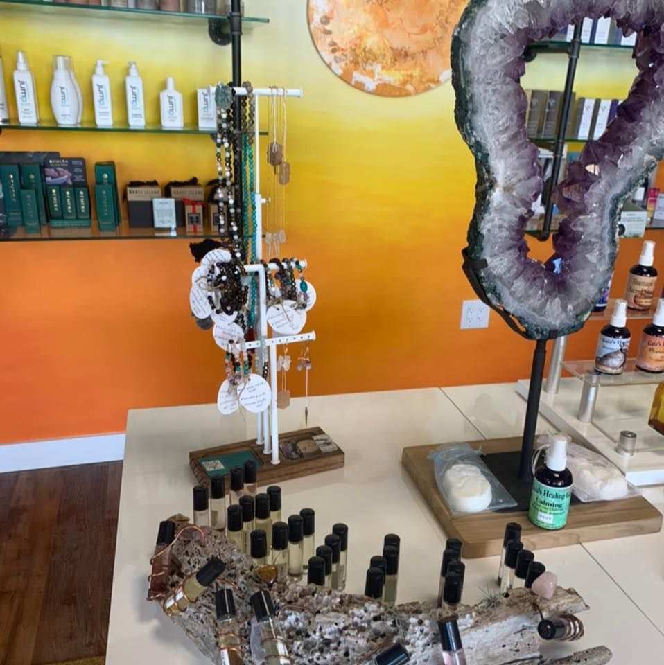 A table in a store with bottles on it