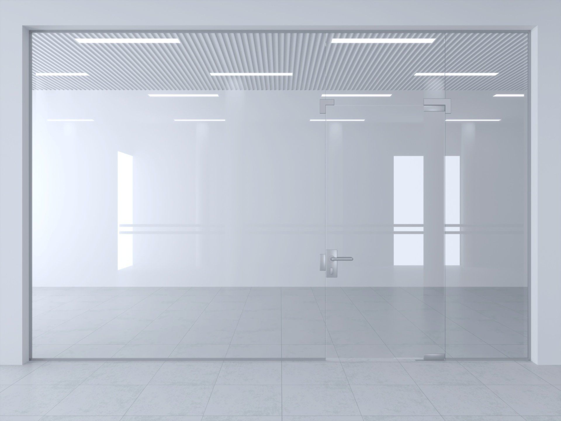 Glass office with a door, white walls, and a tiled floor.