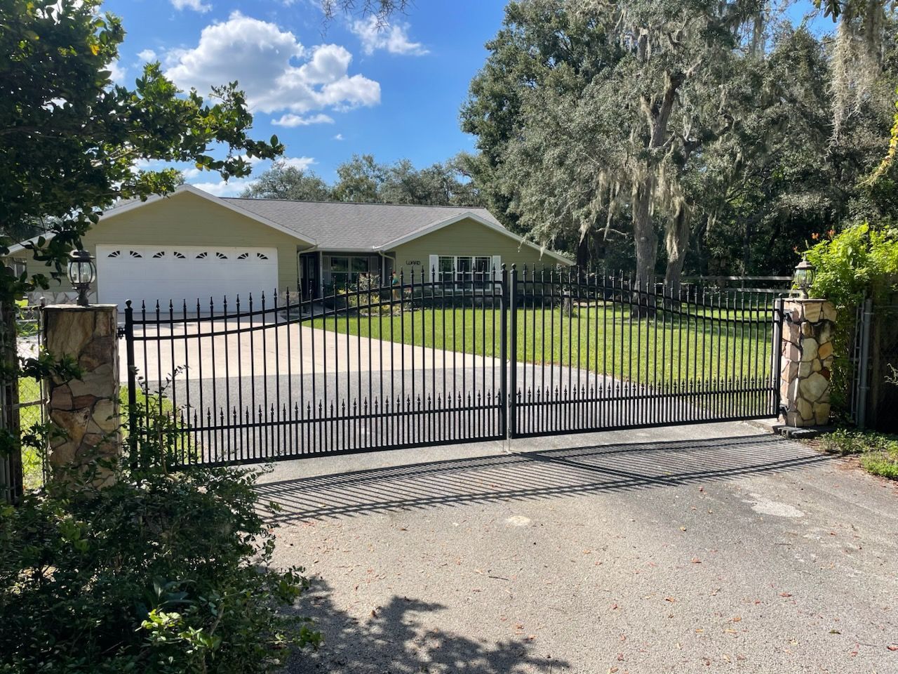 A house with a large gate in front of it