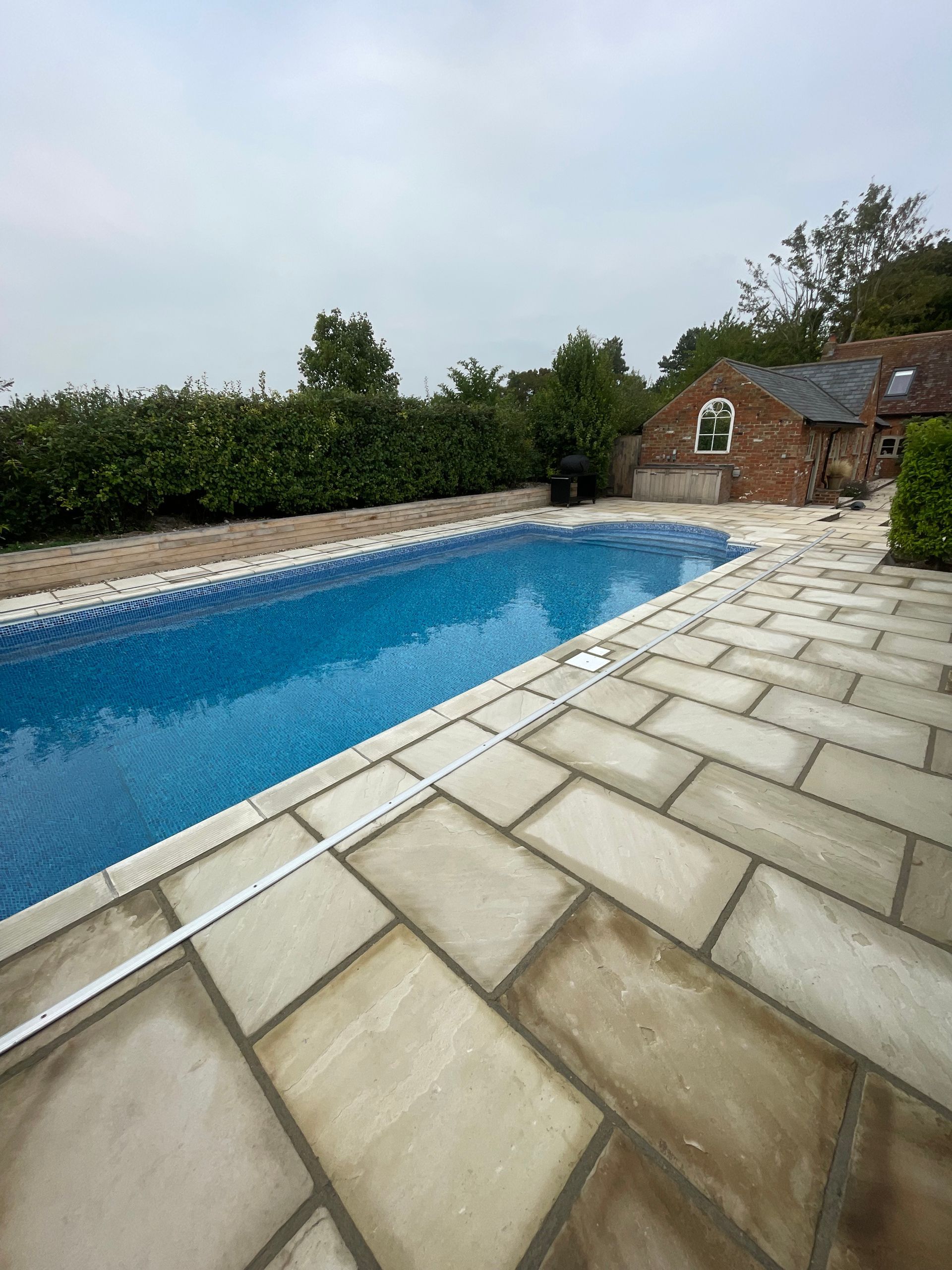 Beautiful Pool with New oak retaining wall, and gorgeous natural stone paving