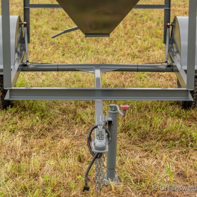 gray bumper hitch and jack of bulk feed trailer