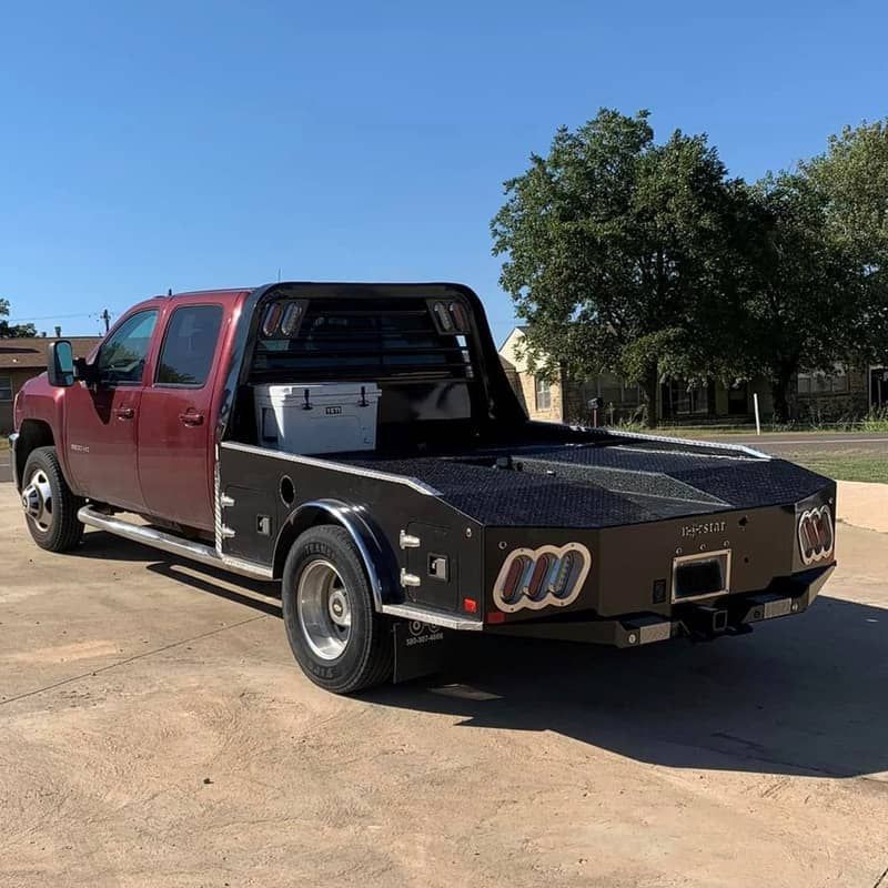 Norstar western hauler bed black in color mounted on maroon chevy truck