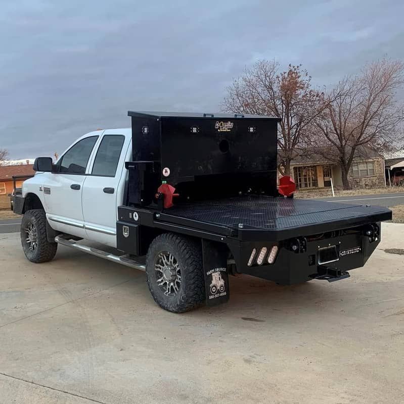 photo of flatbed truck with cattle cube feeder