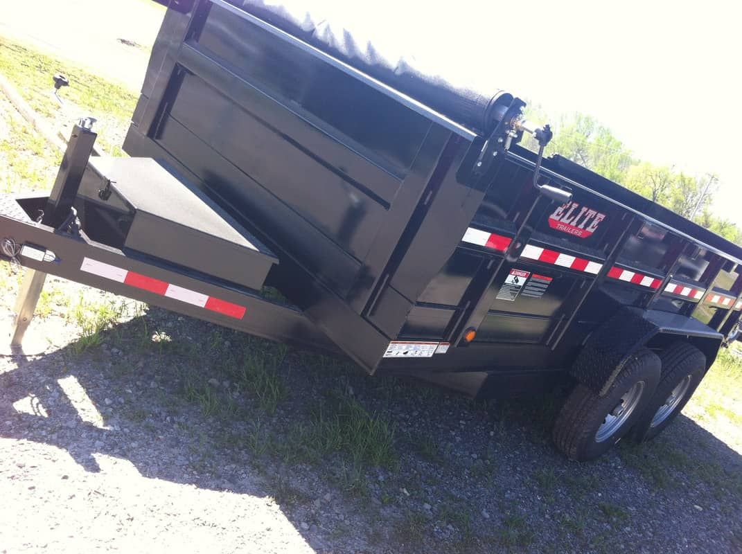 front angle view of black Elite dump trailer