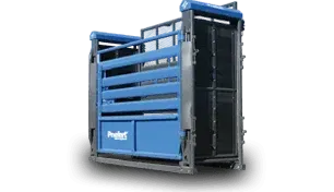 A blue and black cattle squeeze chute with a door on a white background.
