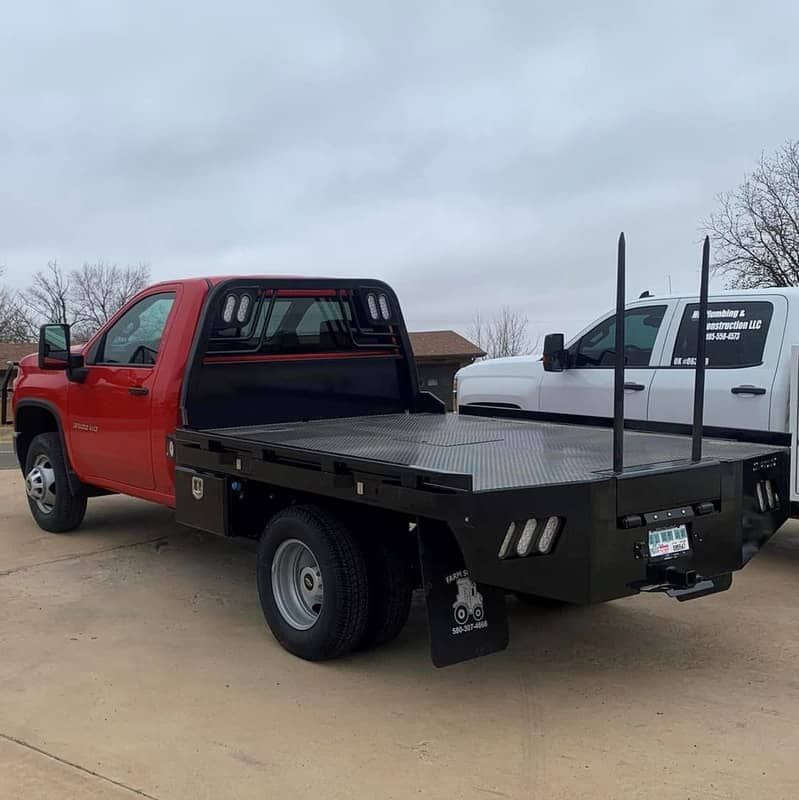 Crownline Spike bed installed on red ford truck