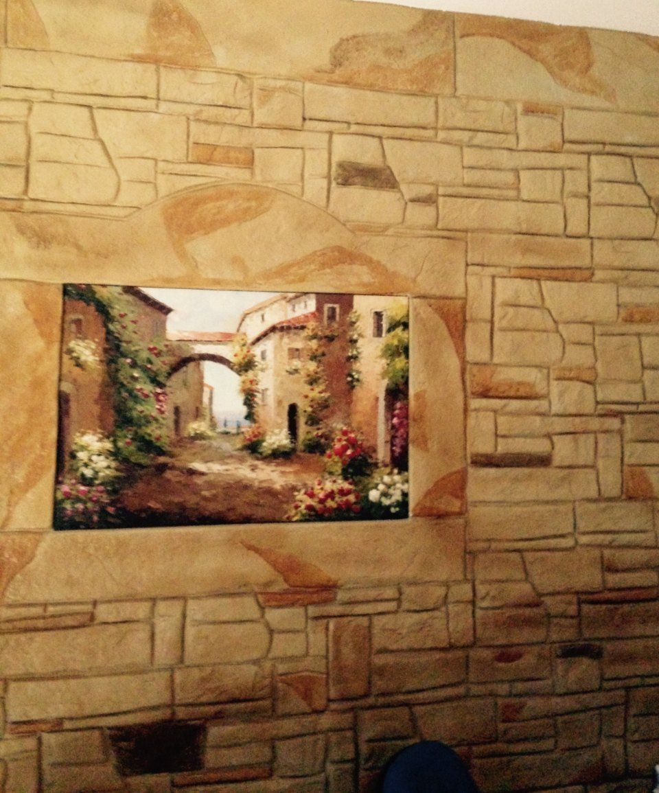 parete in intonaco stampato con quadro