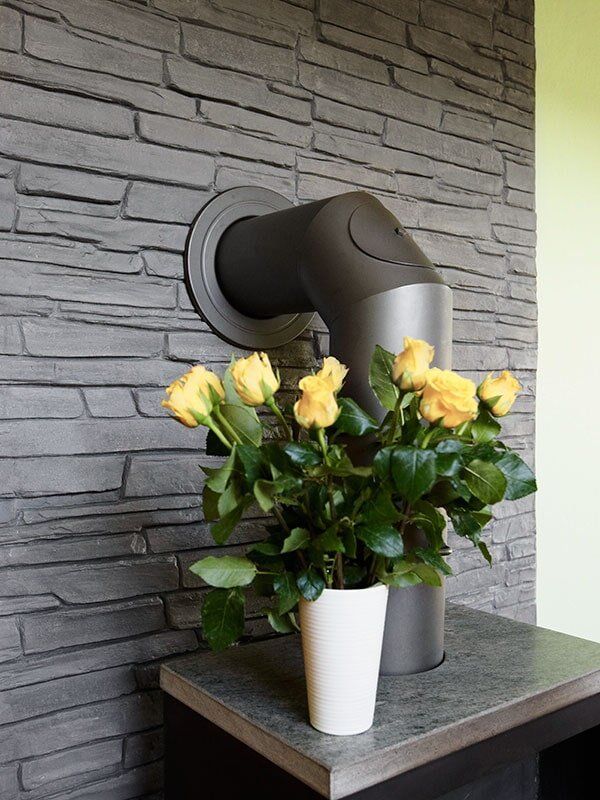 parete con intonaco stampato grigio effetto pietra