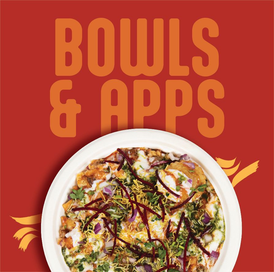 A hand is holding a fried chicken cone with sauce on it ..