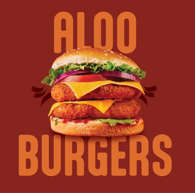 A pile of fried chicken strips on a red background.
