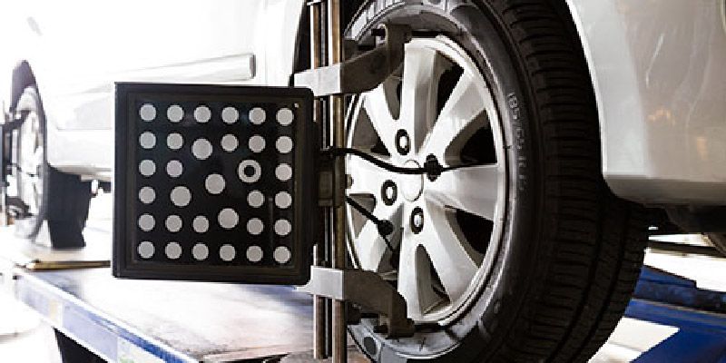 a close up of a car wheel with the word audi on it