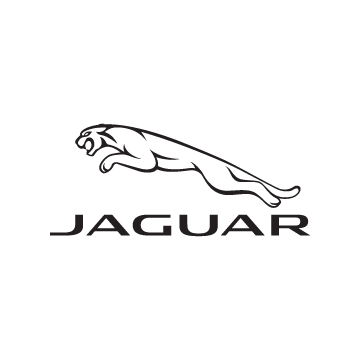 jaguar import vehicle with lights on at night