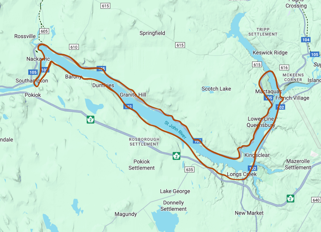 Map of a long, winding lake surrounded by roads, in a mountainous region.