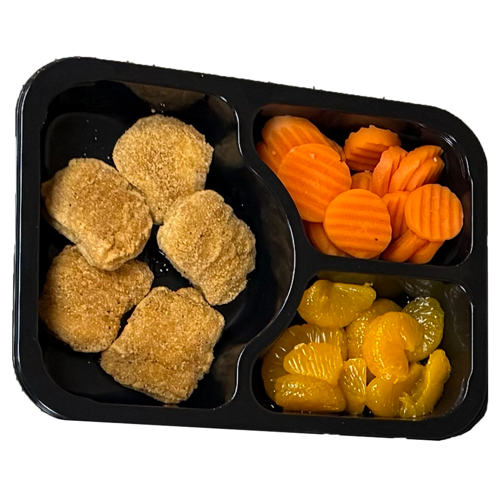 A plastic container filled with chicken nuggets carrots and oranges