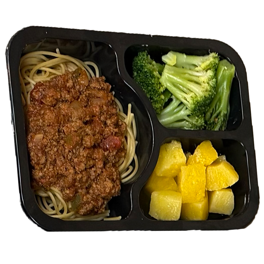 A tray of spaghetti broccoli and pineapple on a white background