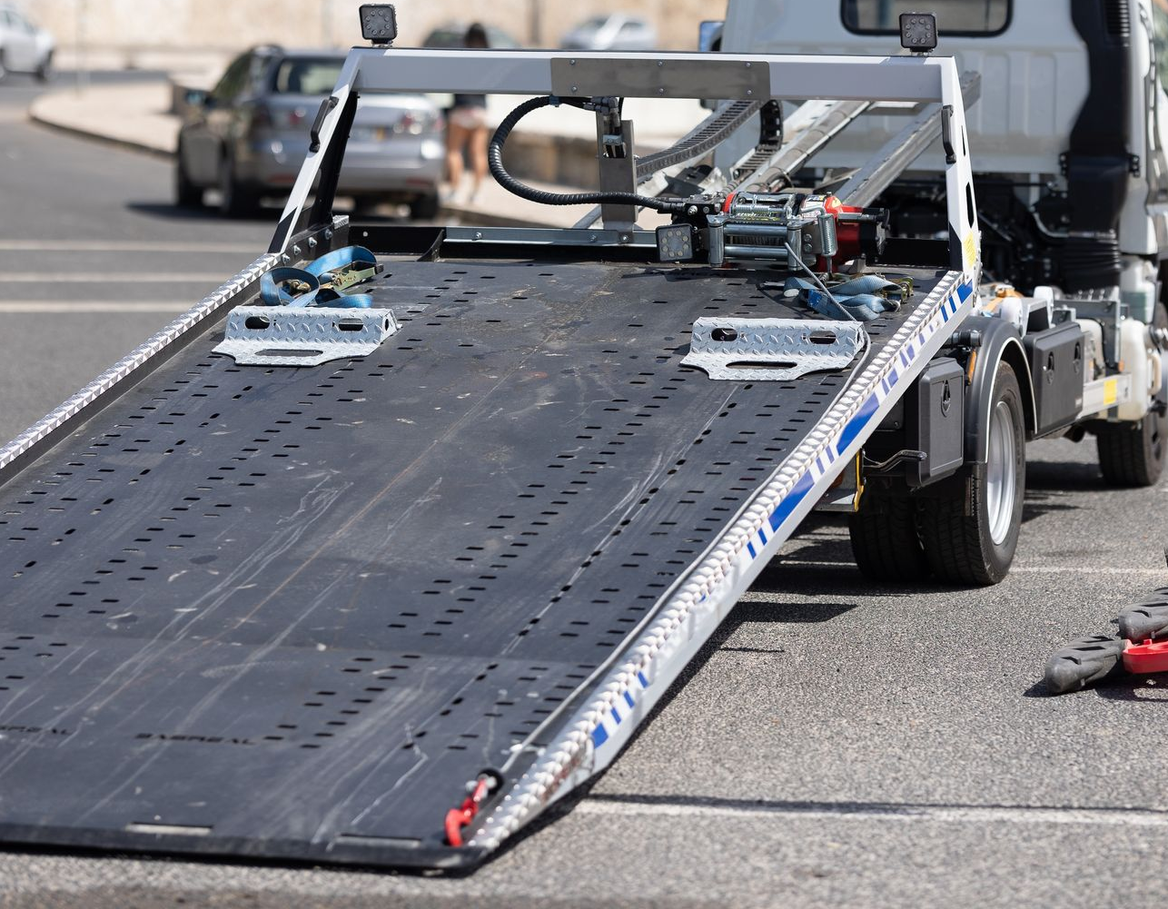 An Empty Flatbed Tow Truck Parked — JP's Towing and Transport in Oakey, QLD