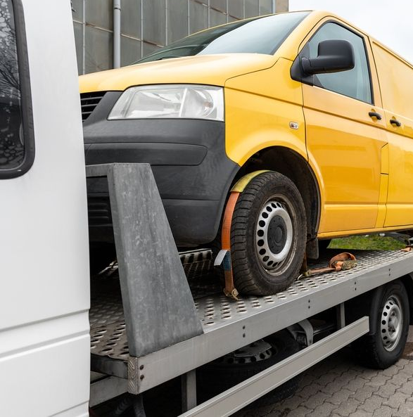 A Bright Yellow Cargo Van — JP's Towing and Transport in Plainlands, QLD
