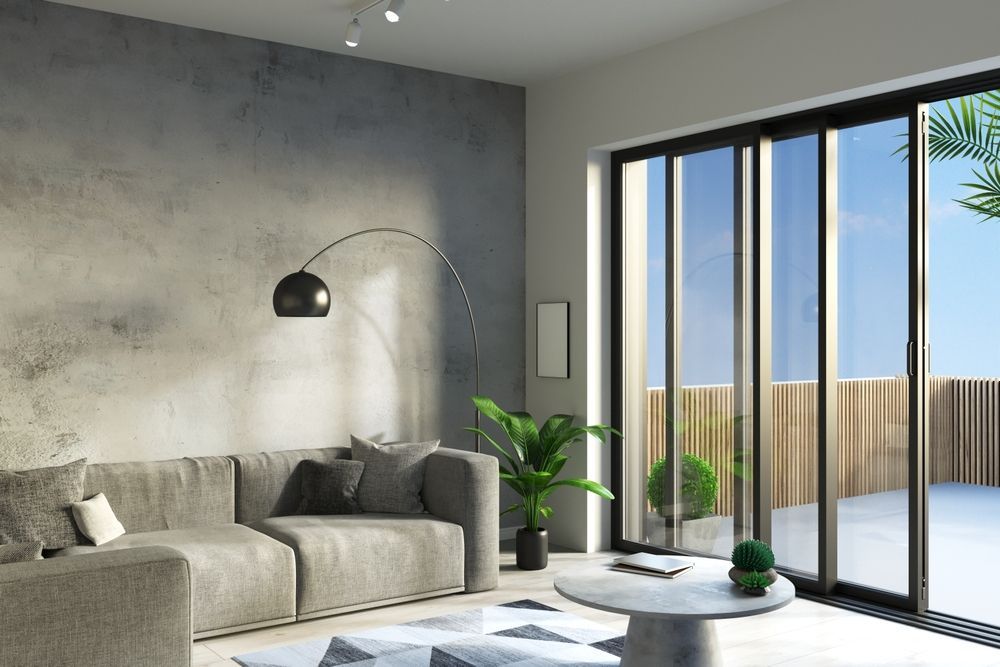 Modern Living Room and Large Sliding Glass Doors to a Patio — ALUBEST Windows & Doors In Southport, QLD