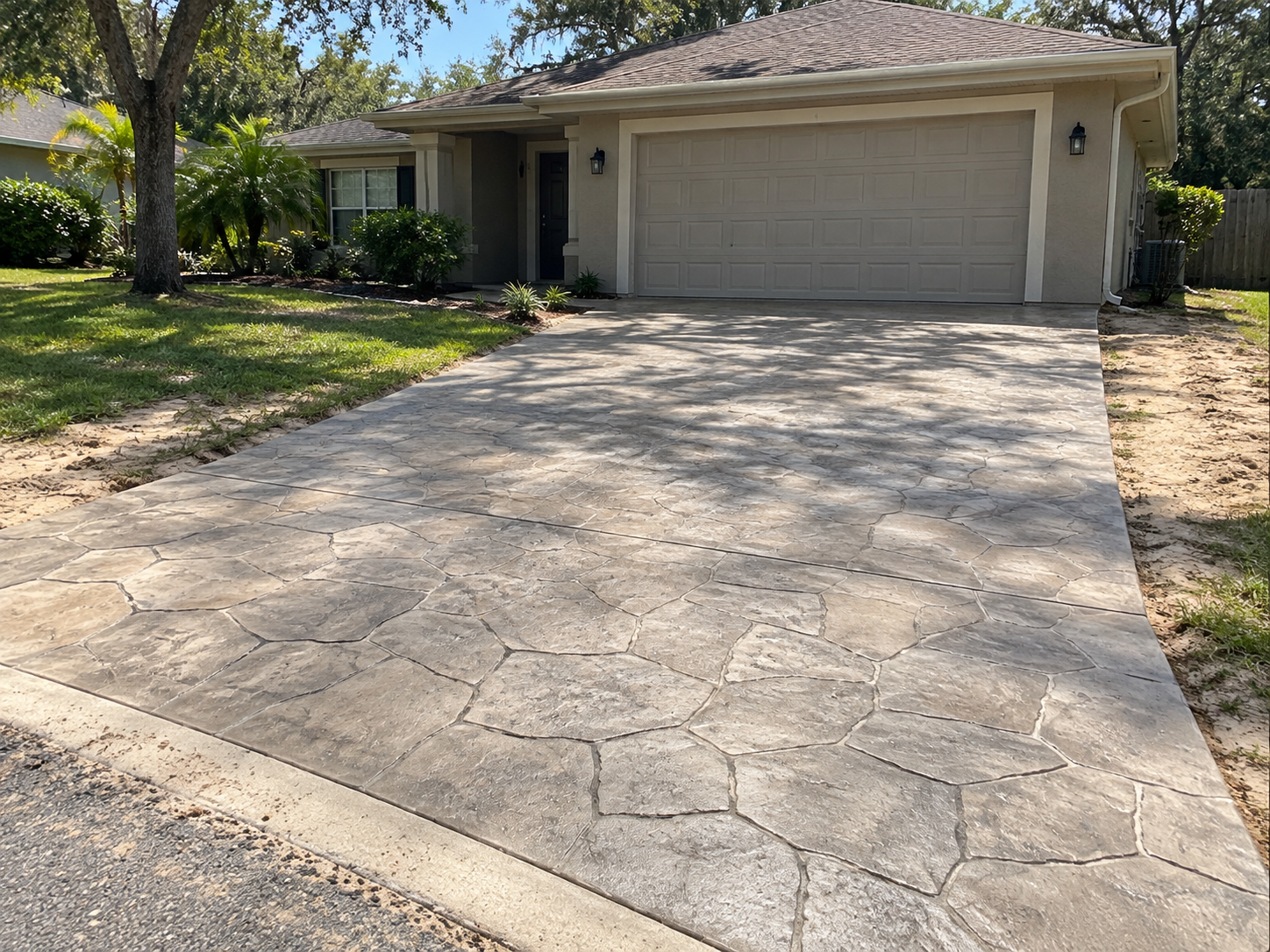 Stamped concrete driveway with a stone pattern on an Ocala, Florida home