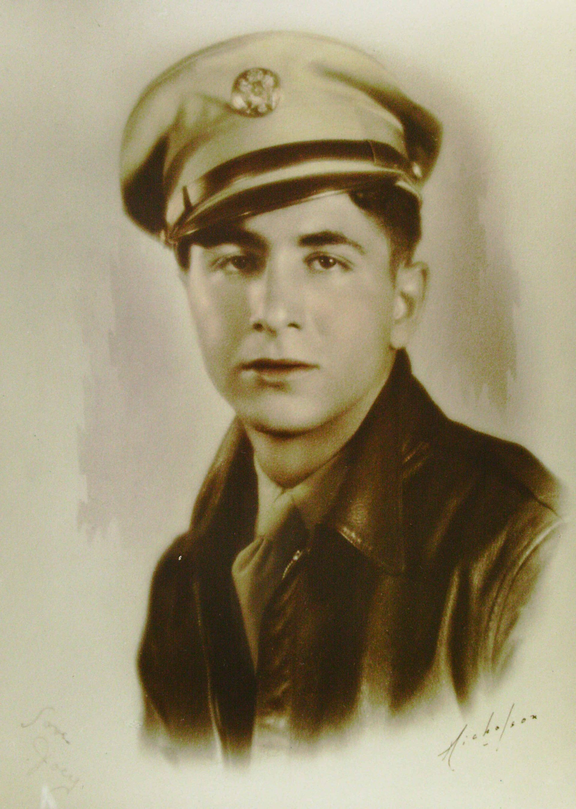 A black and white photo of a man in a military uniform