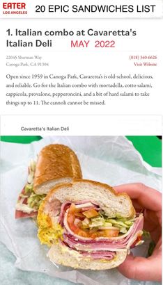 Italian deli “EPIC SANDWICHES” list with a close-up of a sliced sandwich in hand.