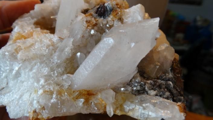 Close-up of white and beige crystal minerals with a rough, sparkling texture