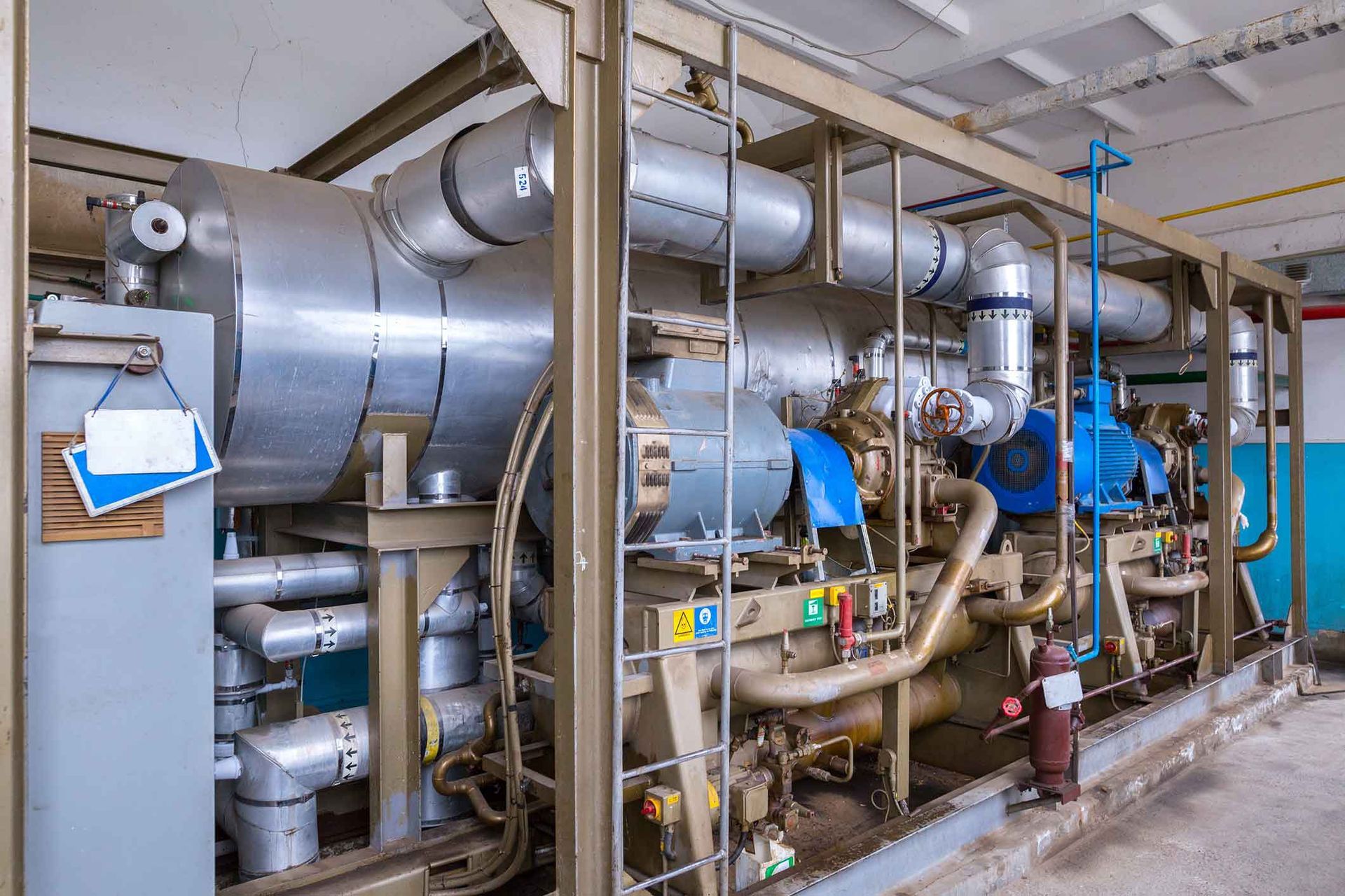 There are a lot of pipes and tubes in this room.