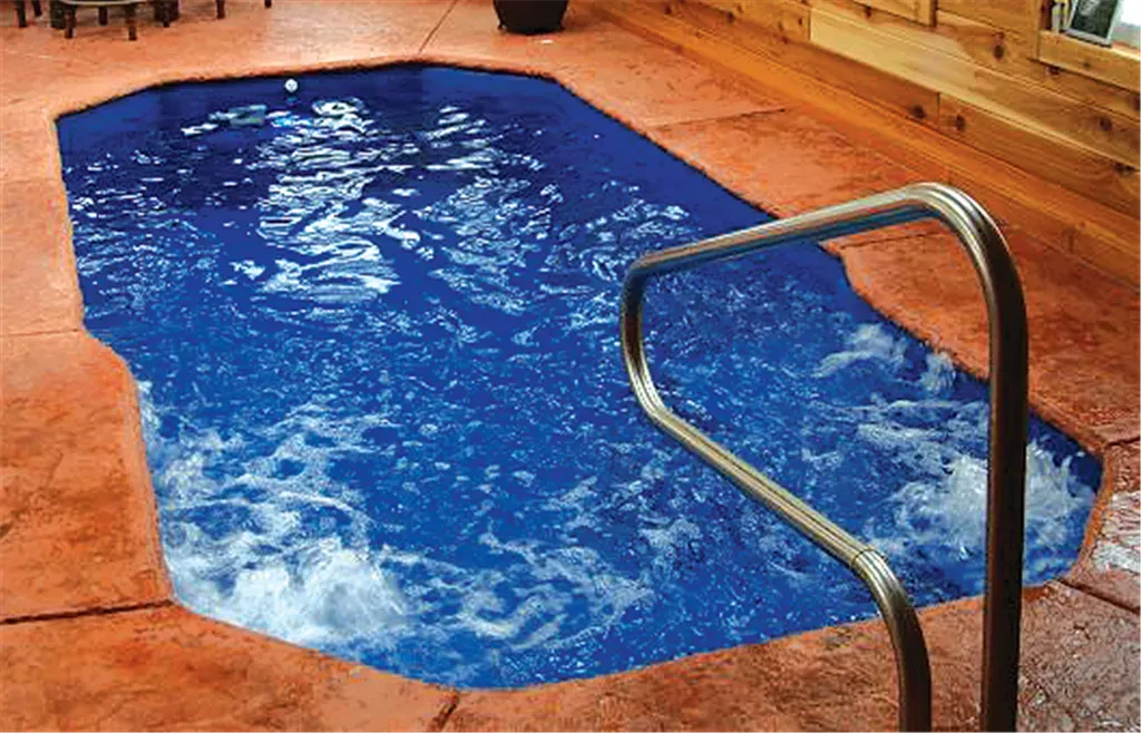 A swimming pool with a staircase leading to it