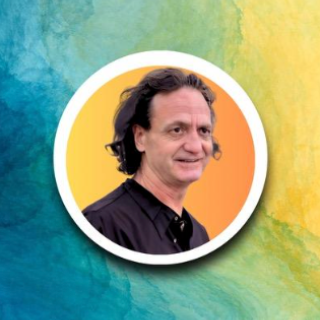 Portrait of a smiling man in a circular frame on a blue, green, and yellow watercolor background