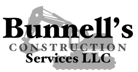 Bunnell&rsquo;s Construction Services LLC logo in black text on a gray house silhouette