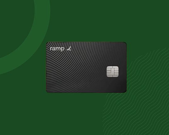 Hand holding a dark, textured credit card with the Ramp logo, against a light blue background.