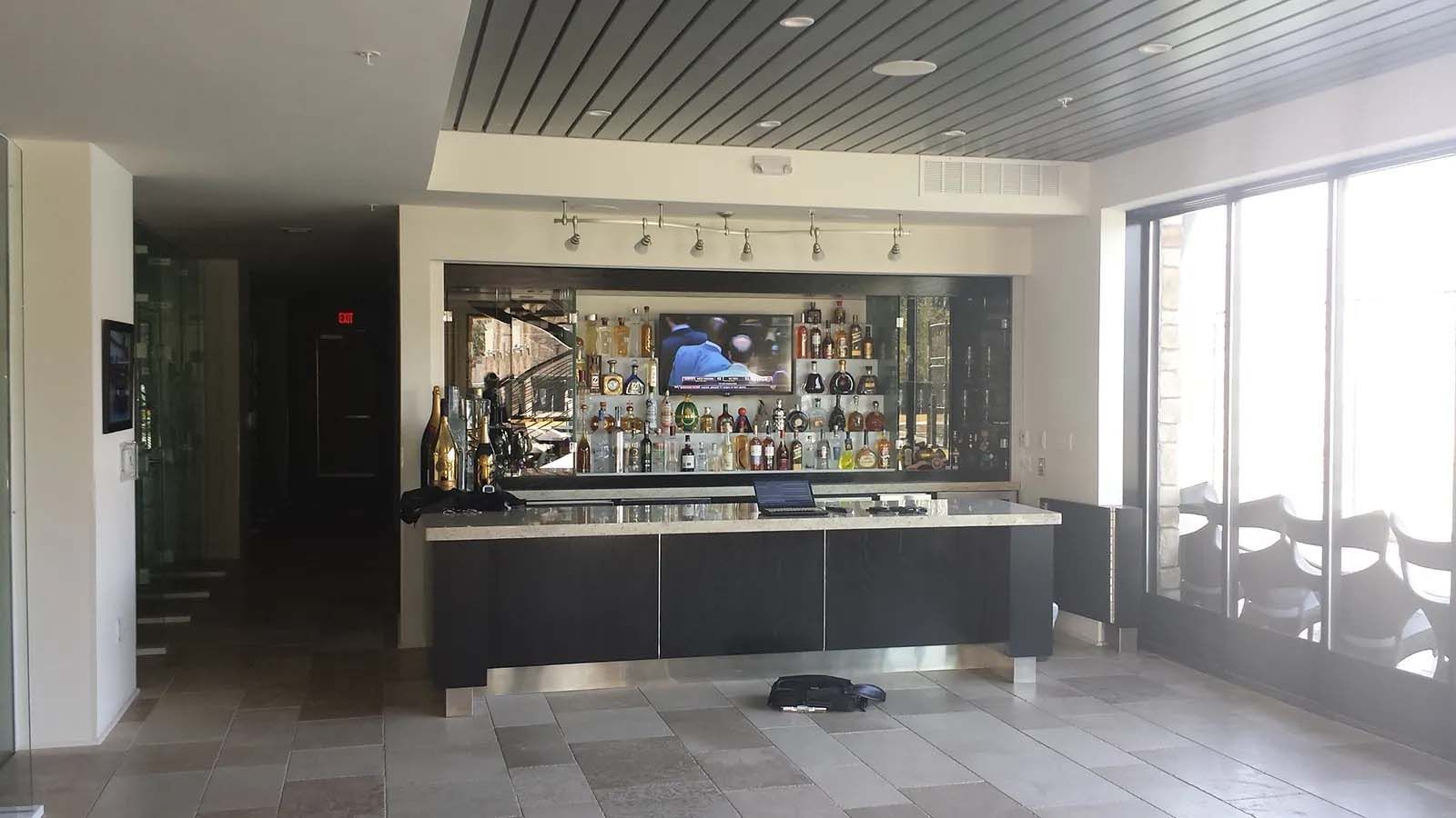There is a bar in the middle of the room.