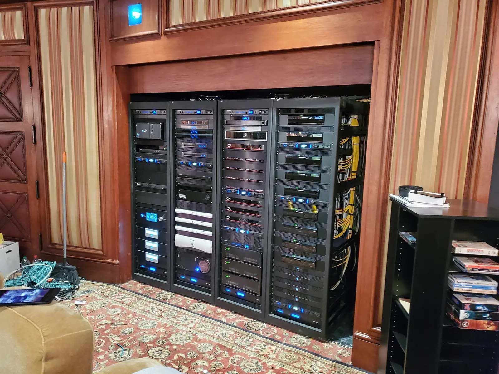 A living room with a lot of servers in it.