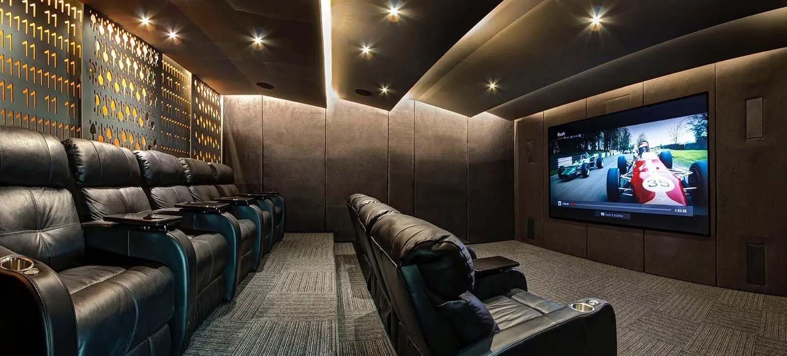 A rendering of a home theater with a large flat screen tv.