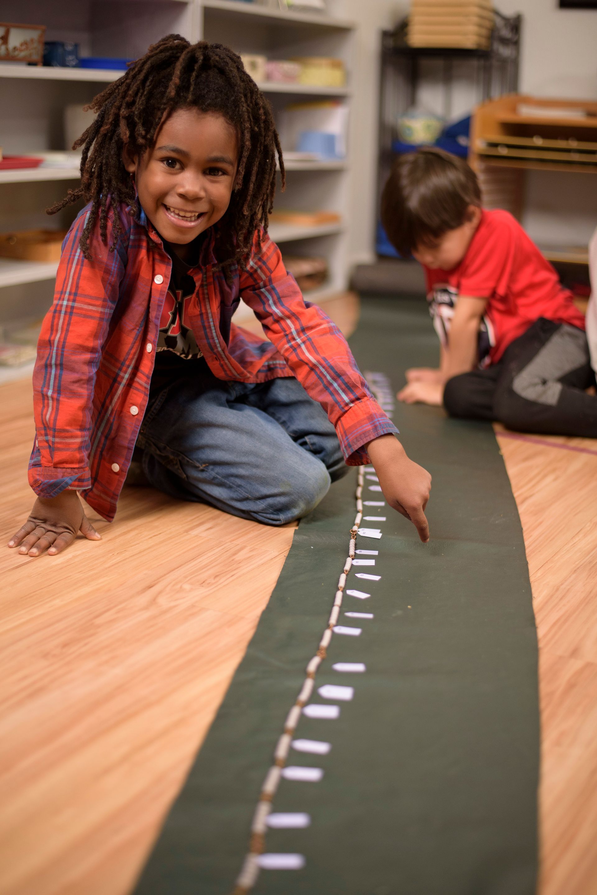 Montessori child working in the classroom
