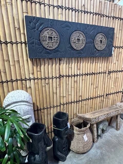 Balinese décor on a Bamboo Background — Sun City Pools In Hyde Park, QLD