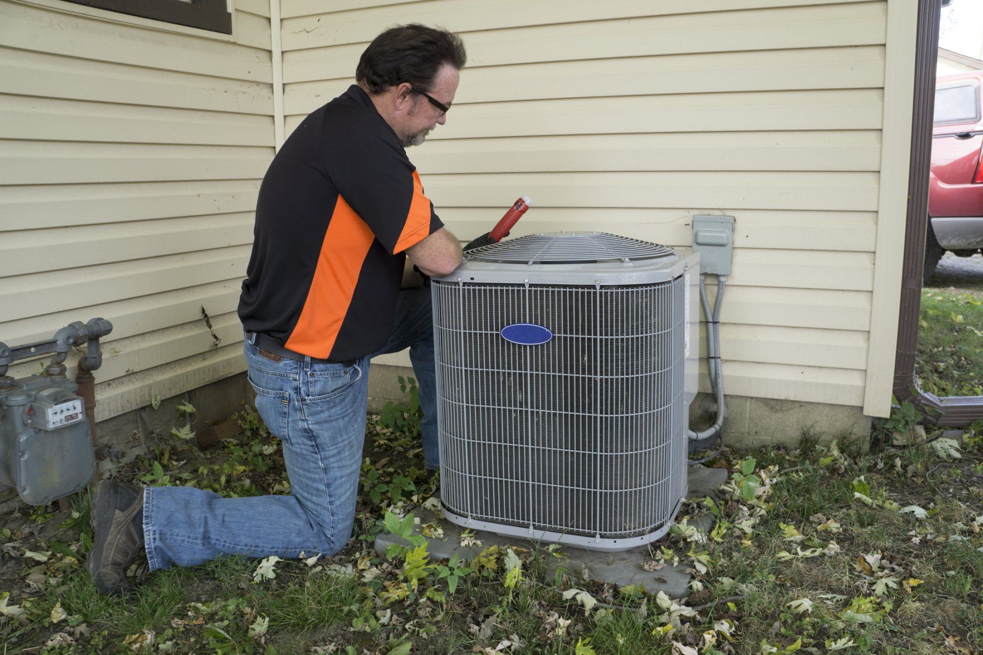 Man Fixing Aircon — Las Vegas, NV — Lin-Air